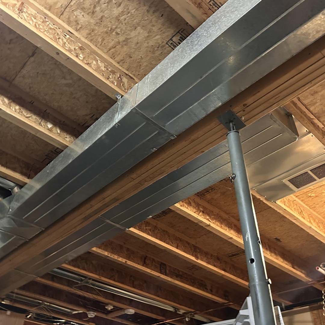 HVAC ductwork in renovated house interior
